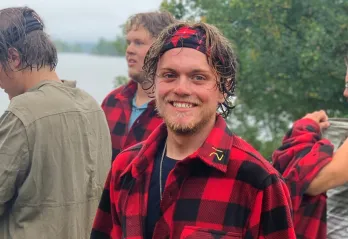 Photo of JP Garcia at Camp Stephens with other campers in the background