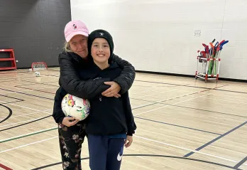 [image] Charlene and son, Hunter, in Y Winnipeg gym