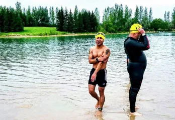 Fidey Pacay competes in his first triathlon after learning to swim at the Y