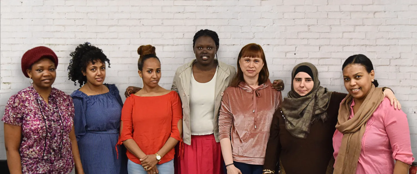 Group of Newcomer Women Standing Together