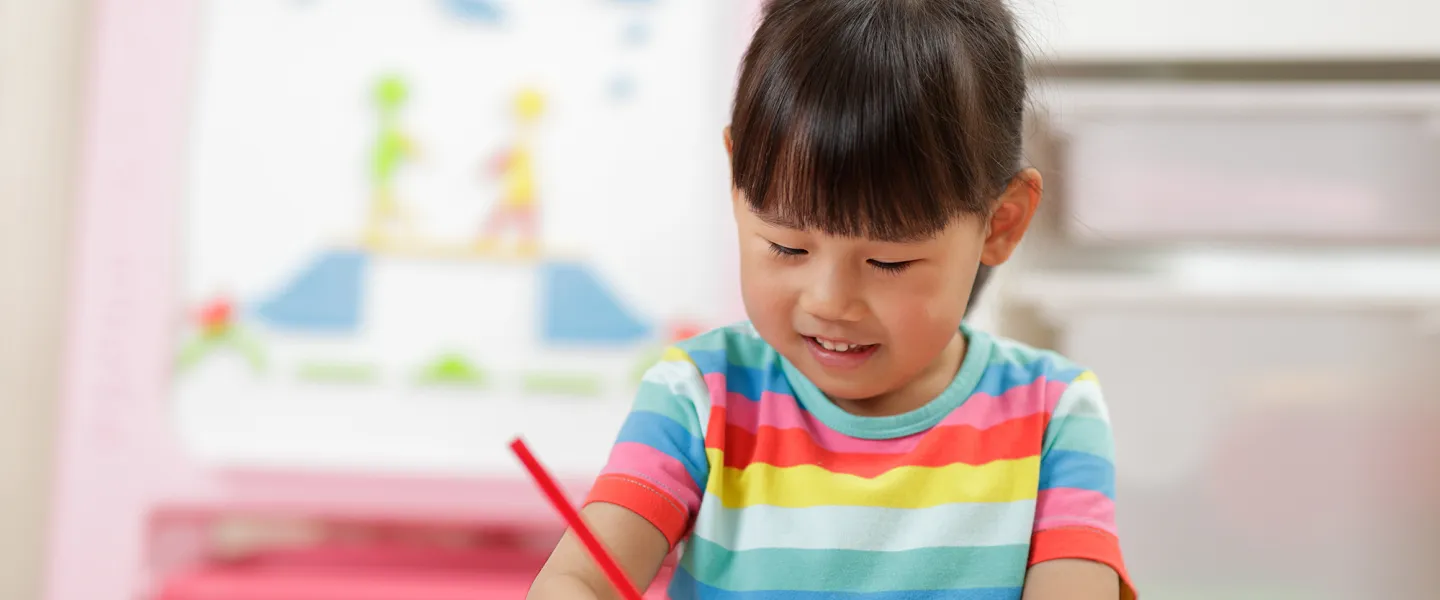 image of asian girl colouring