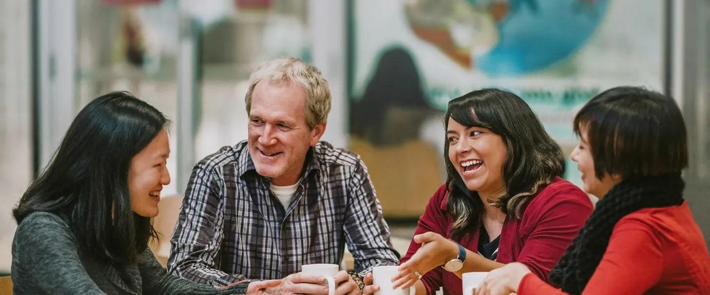 [Image] Group of people having coffee and talking