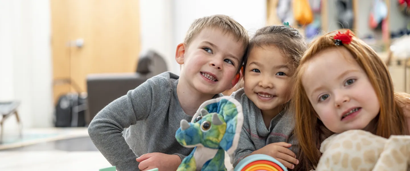 [Image] three kids at child care centre