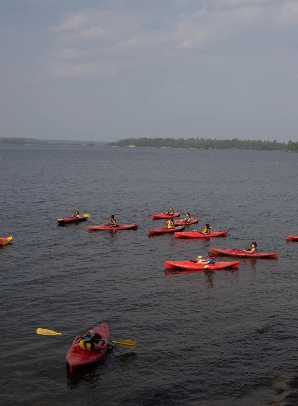 view of kayakers from shoreline