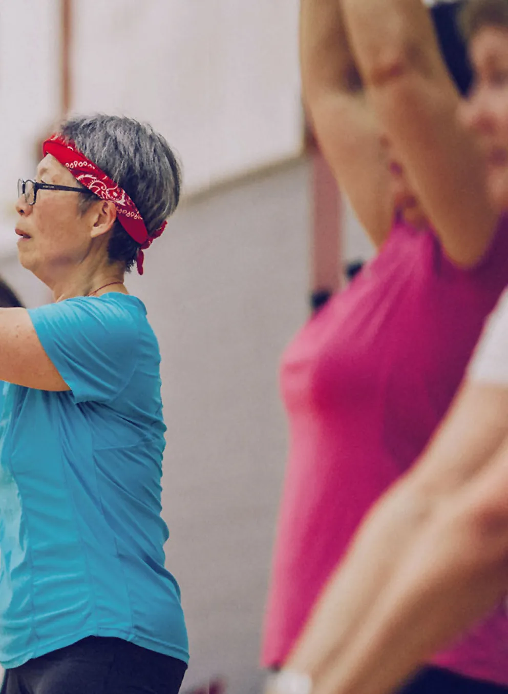 image of group fitness class with kettlebells and weights