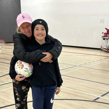 [image] Charlene and son, Hunter, in Y Winnipeg gym