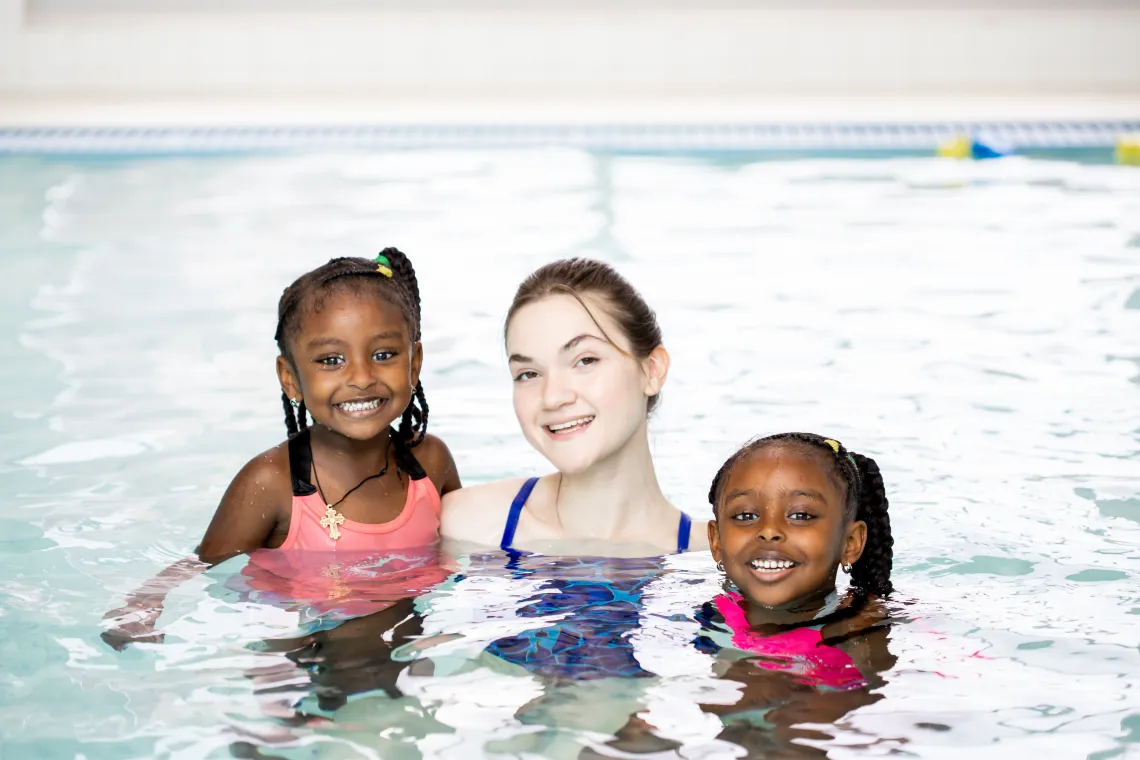 Image of swim instructor with two girls in a pool