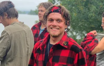 Photo of JP Garcia at Camp Stephens with other campers in the background