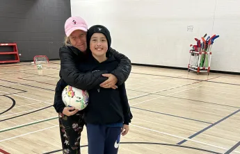 [image] Charlene and son, Hunter, in Y Winnipeg gym