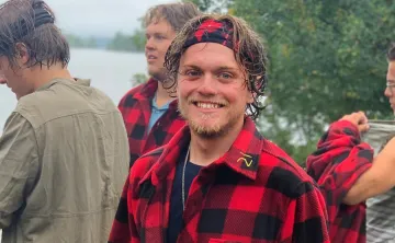 Photo of JP Garcia at Camp Stephens with other campers in the background